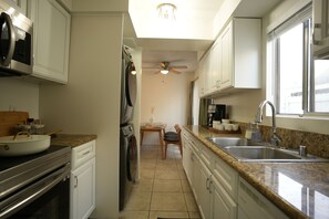 Fridge, microwave, oven, stovetop - Sleek 2BR Townhouse - 2 King Beds Surf City Huntington Beach- Disney& Beach (Huntington Beach)