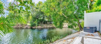 Canal Views from Pool w BBQ and Pit | Miami Escape