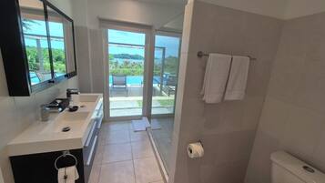 Shower, hair dryer, towels, soap