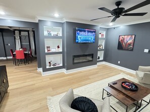 Smart TV, fireplace, DVD player, books