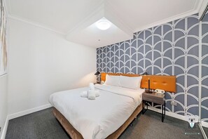Iron/ironing board, WiFi, bed sheets - KozyGuru | Haymarket | Top-notch City Adobe (Haymarket)