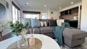 Living area - KozyGuru | Pakenham | Comfortable 4-Bedroom House (Pakenham)