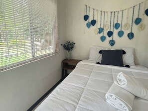 Chambre Deluxe double, vue sur le jardin | Rideaux d’obscurcissement, fer et planche à repasser