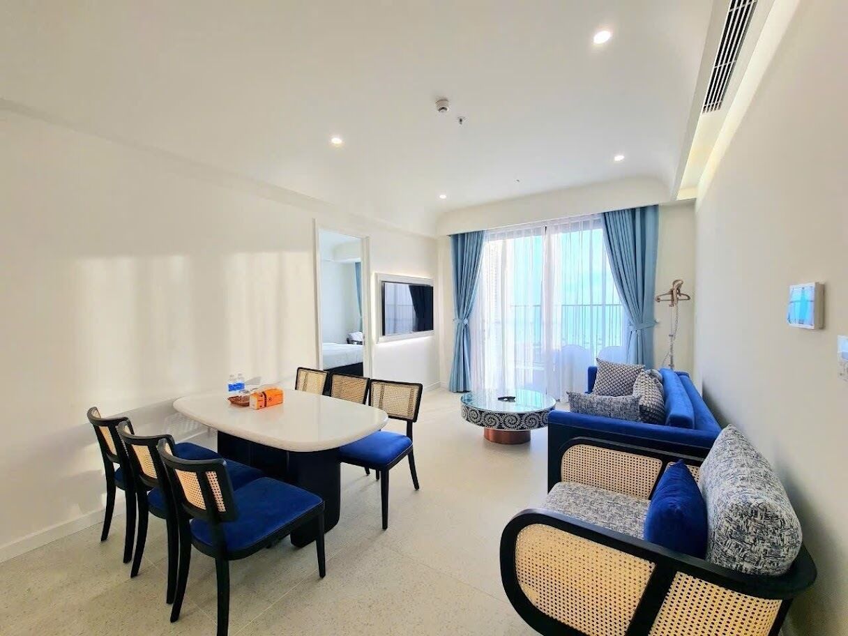 Kamar Triple Keluarga, pemandangan laut | Area keluarga | TV LED