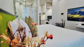 Luxury Apartment, 1 Bedroom, Balcony, Ocean View | 2 bedrooms, in-room safe, desk, iron/ironing board