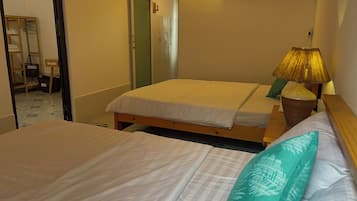 Family Room, Garden View | Desk, laptop workspace, blackout drapes, free WiFi