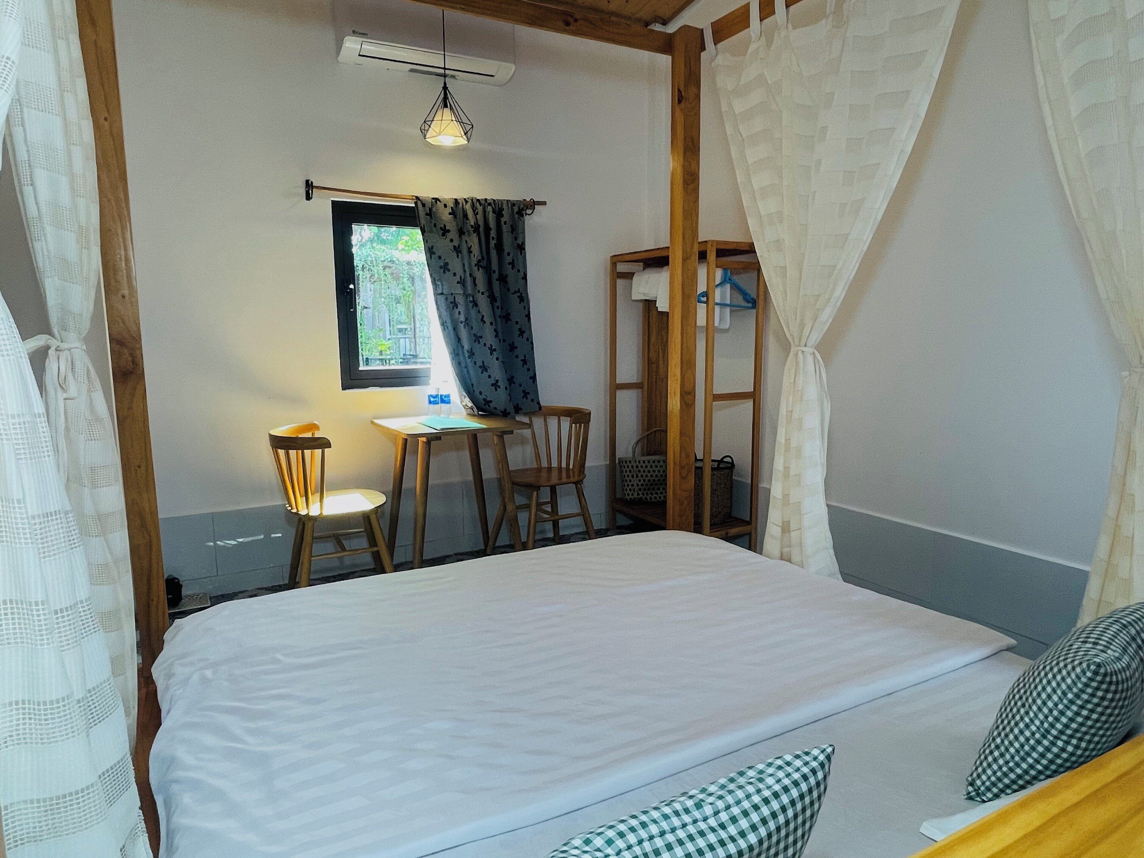 Standard Double Room, Garden View | Desk, laptop workspace, blackout drapes, free WiFi
