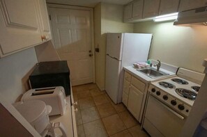 Fridge, microwave, toaster, cookware/dishes/utensils