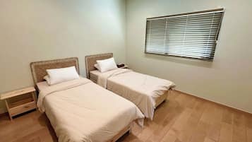 2 habitaciones, escritorio, wifi gratis y ropa de cama