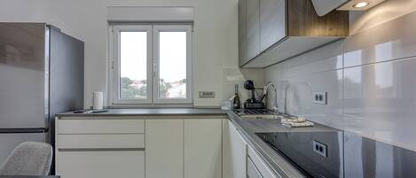 Family Apartment, 1 Bedroom (Royal Premantura) | Private kitchen | Fridge, microwave, oven, stovetop