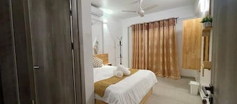 Spacious 3-bedroom apartment with WiFi, AC in charming Phase 02