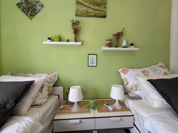 2 habitaciones, tabla de planchar con plancha, internet y ropa de cama 