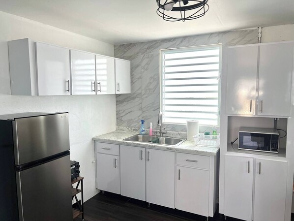 Microwave, stovetop, coffee/tea maker, toaster