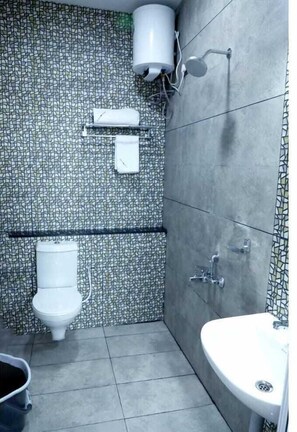 Shower, free toiletries, towels, soap