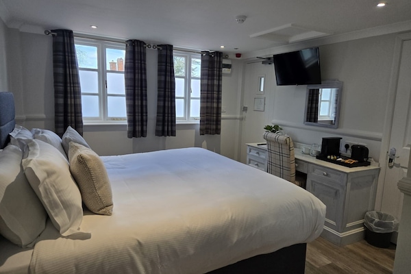 Escriptori i espai de treball apte per a portàtils