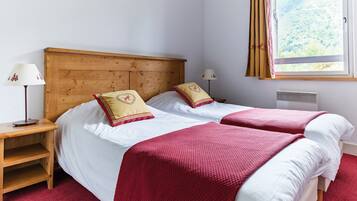 1 bedroom, travel crib, WiFi, bed sheets