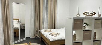 Modern apartment near the main train station - central & well connected