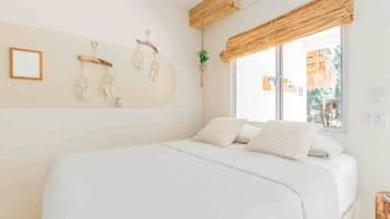1 bedroom, desk, iron/ironing board, travel crib