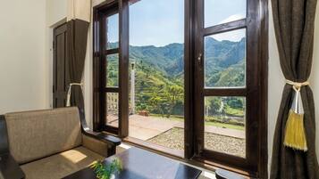 Deluxe Room With Balcony Mountain View | Premium bedding, desk, laptop workspace, free WiFi