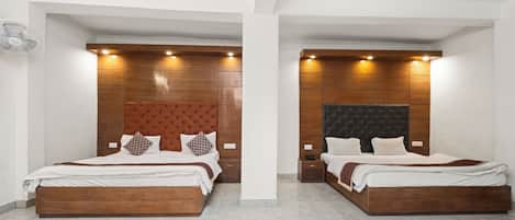 Family Room | Premium bedding, desk, laptop workspace, free WiFi