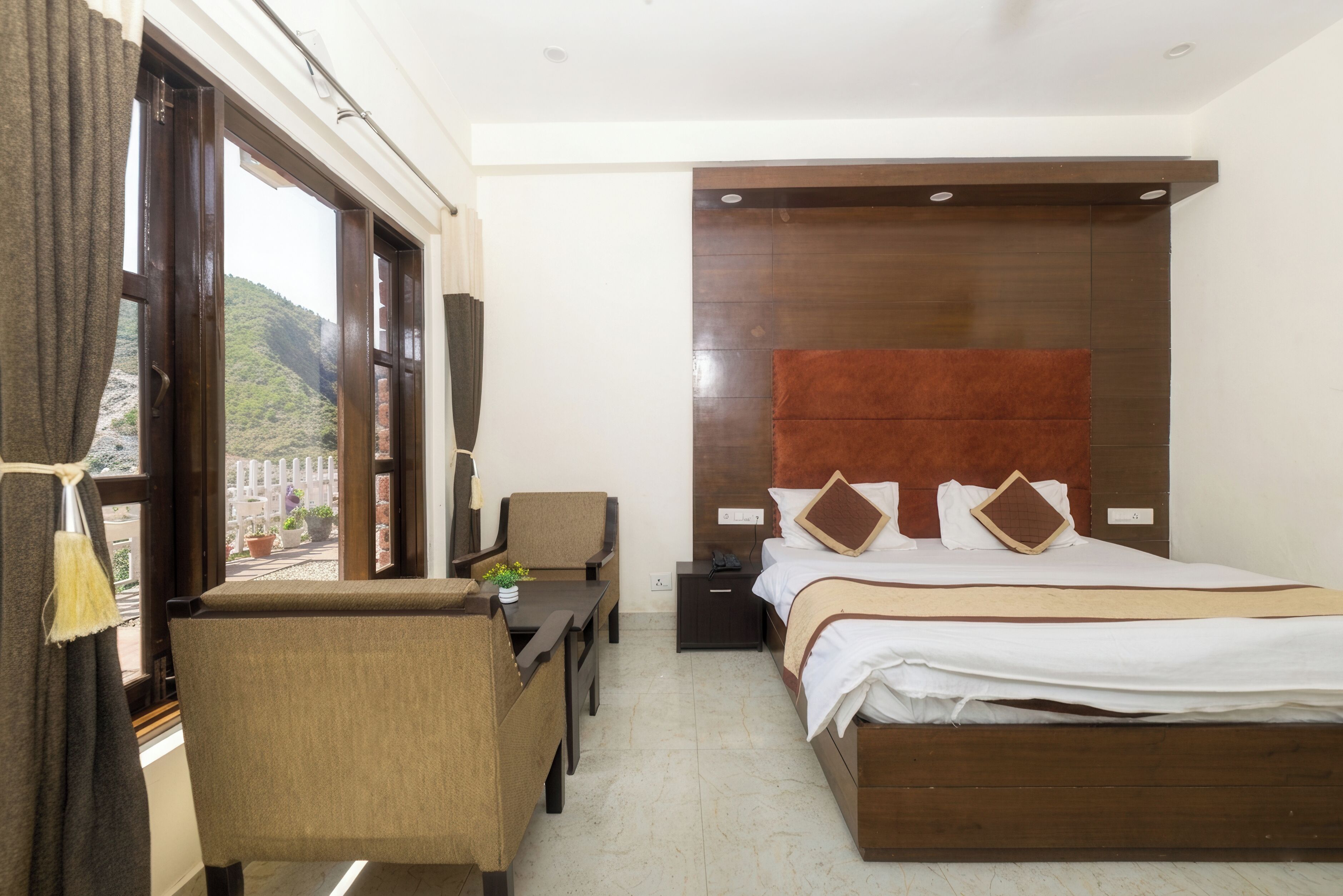 Deluxe Room With Balcony Mountain View | Premium bedding, desk, laptop workspace, free WiFi