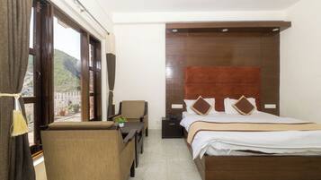 Deluxe Room With Balcony Mountain View | Premium bedding, desk, laptop workspace, free WiFi