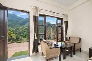 Deluxe Room With Balcony Mountain View | Premium bedding, desk, laptop workspace, free WiFi - Hotel Sun Village by Palm Aryan (Mussoorie)