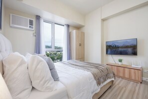 1 habitación, tabla de planchar con plancha, wifi y ropa de cama 