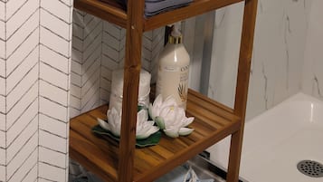 Hair dryer, towels, soap, shampoo