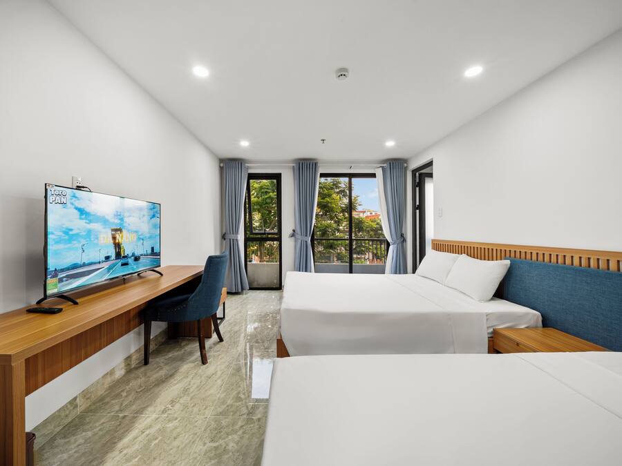 Quarto triplo, vista para a cidade | Wi-Fi de cortesia