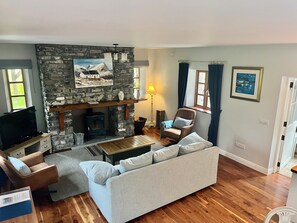 Smart TV, fireplace, DVD player, books