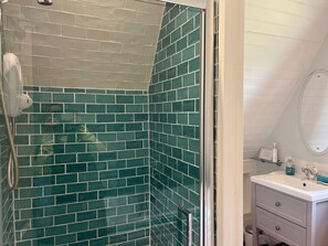 Jetted bath, hair dryer, towels, soap