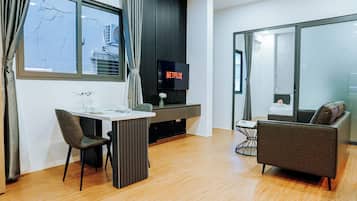 Quarto casal luxo | Área de estar