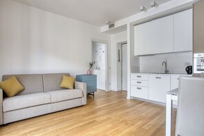 Apartamento familiar, vistas a la ciudad | Zona de estar