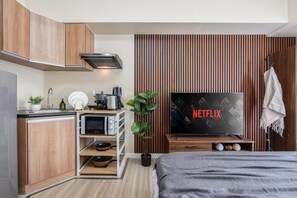 1 slaapkamer, een strijkplank/strijkijzer, wifi, beddengoed