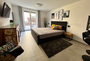 1 dormitorio, tabla de planchar con plancha, wifi gratis y ropa de cama