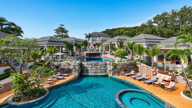 A resort with a central swimming pool, lounge areas, and multiple villas. - A.Z. Sunrise Resort & Fitness Club (Choeng Thale)