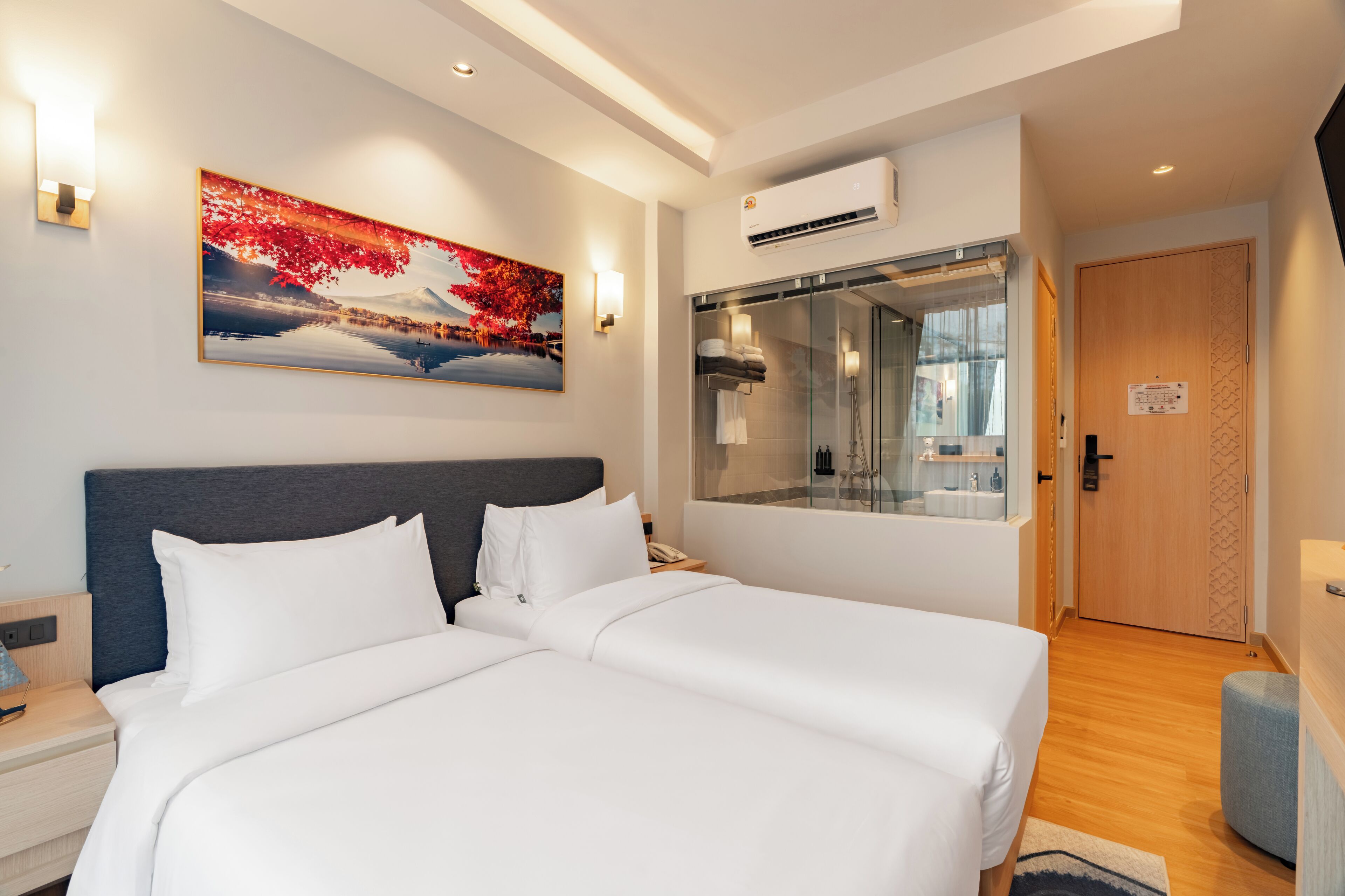 Chambre Standard avec lits jumeaux | Coffre-fort, literie fournie