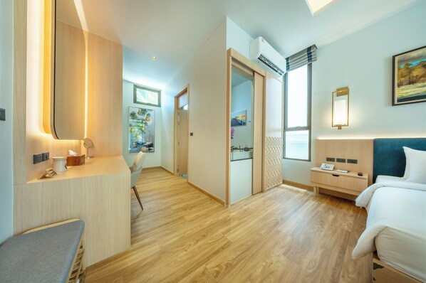 Deluxe Double Room, Pool View | 1 bedroom, in-room safe, desk, bed sheets