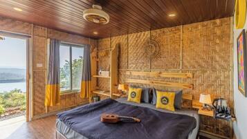 Habitación doble Deluxe (Double Hut - Breakfast Included) | 1 habitación, tabla de planchar con plancha y ropa de cama