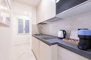 Lägenhet (3 Bedrooms) | Eget kök | Mikrovågsugn, espressobryggare och vattenkokare