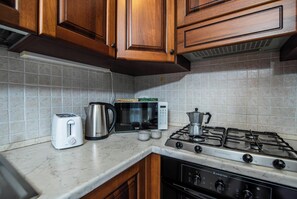 Family Apartment, Multiple Bedrooms, 2 Bathrooms (Scacciapensieri) | Private kitchen | Fridge, microwave, oven, stovetop - Scacciapensieri (Olbia)