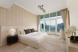 A modern bedroom with a large bed, a nightstand, a lamp, a potted plant, and a view of the city through large windows.