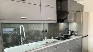 Coffee/tea maker, fridge, oven, toaster