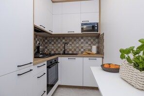 Classic Apartment, Balcony, City View | Private kitchen - ShortStayPoland Twarda B35 (Warsaw)