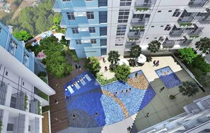 Apartment, 2 Bedrooms, Accessible, Balcony | Pool | Outdoor pool - 2br Unit at Asmara Near St Lukes Medical Center (Quezon City)