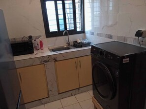 Appartamento, 1 camera da letto | Lavanderia