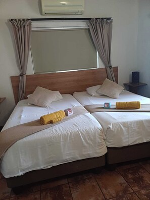 2 chambres, fer et planche à repasser, Wi-Fi, draps fournis