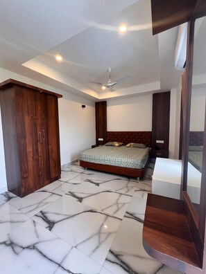 Deluxe Room, City View | Premium bedding, memory foam beds, minibar, desk - Ahlan Homestays (Port Blair)
