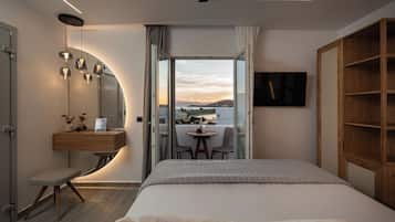 Suite Premium, letti multipli, vista mare, lato spiaggia | Biancheria da letto di alta qualità, materassi in memory foam